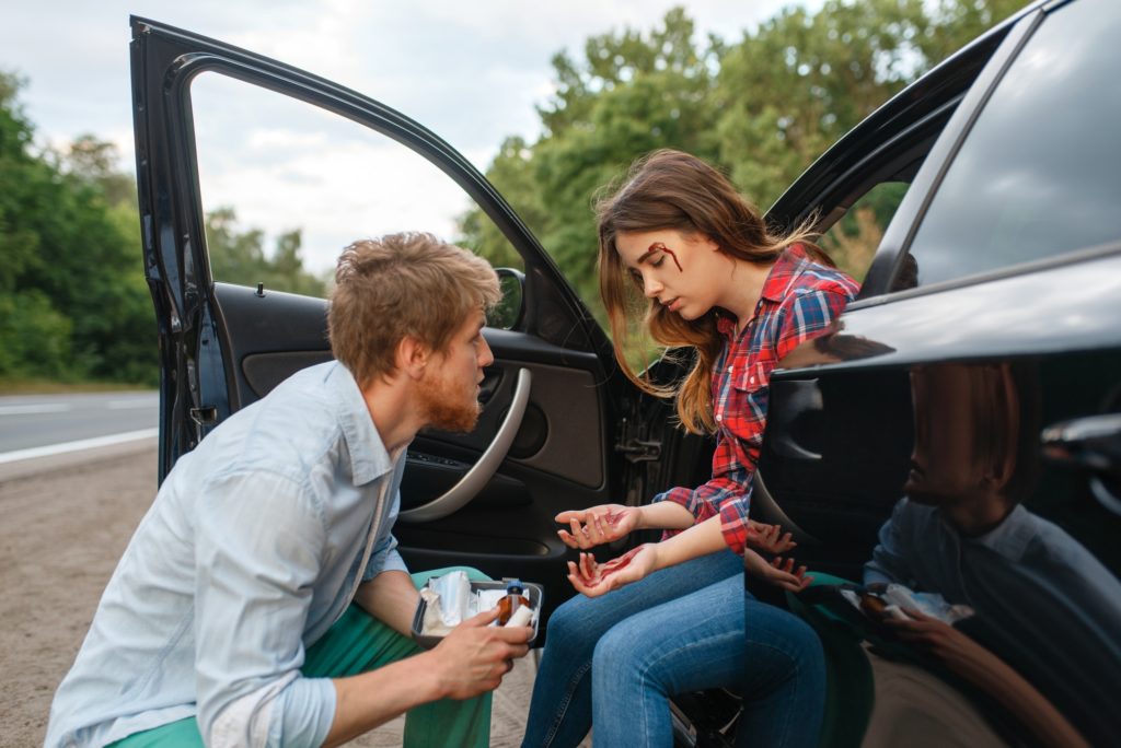 Man provides first aid to female driver, accident